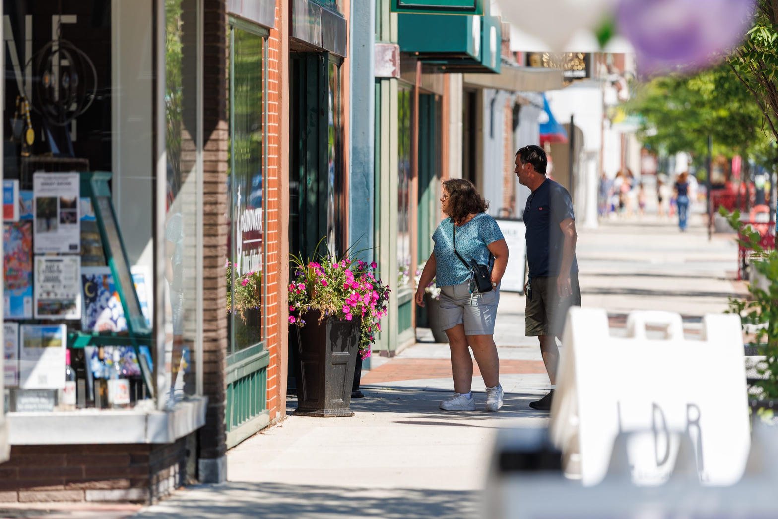 People walking downtown Concord on Main Street