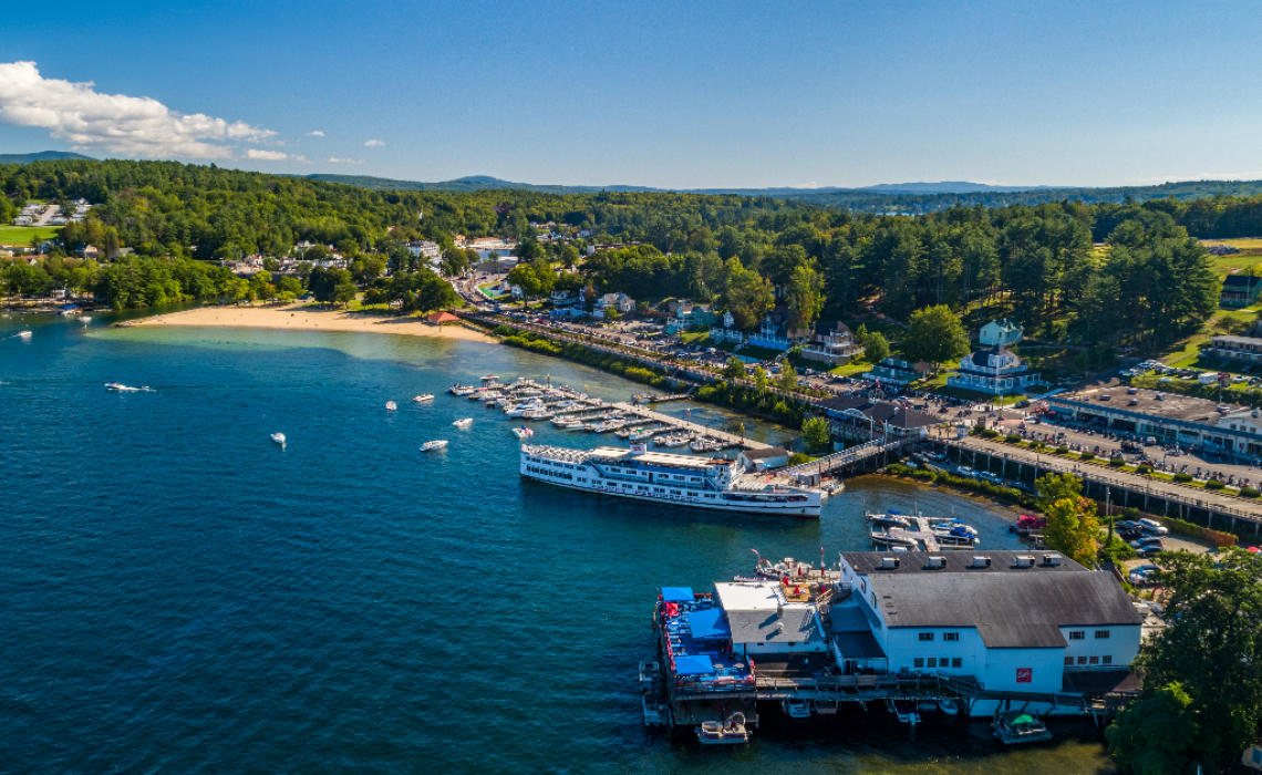 Aerial view of Weirs Beach and Lake Winnipesaukee with boats and the boardwalk