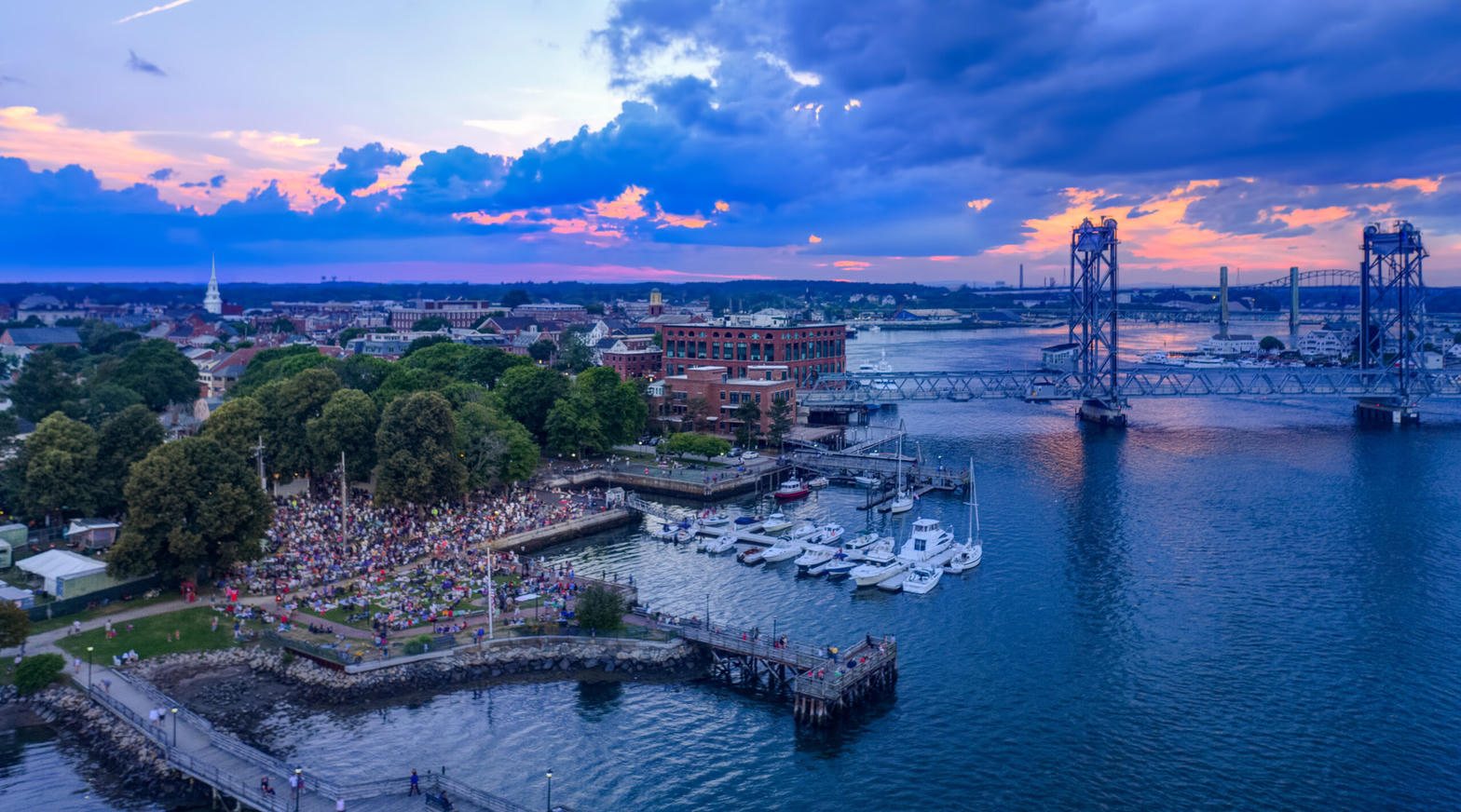 Portsmouth harbor at sunset with Prescott Park and the Memorial Bridge